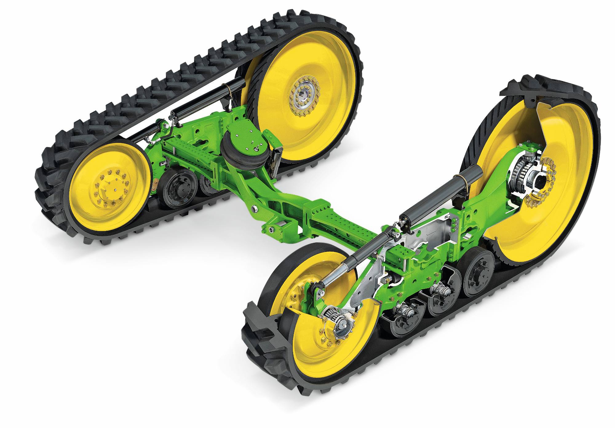 Sklopi gosenic traktorja John Deere z gumijastimi gosenicami, vzmetnimi rokami in rumenimi pogonskimi kolesi, prikazani na belem studijskem ozadju.