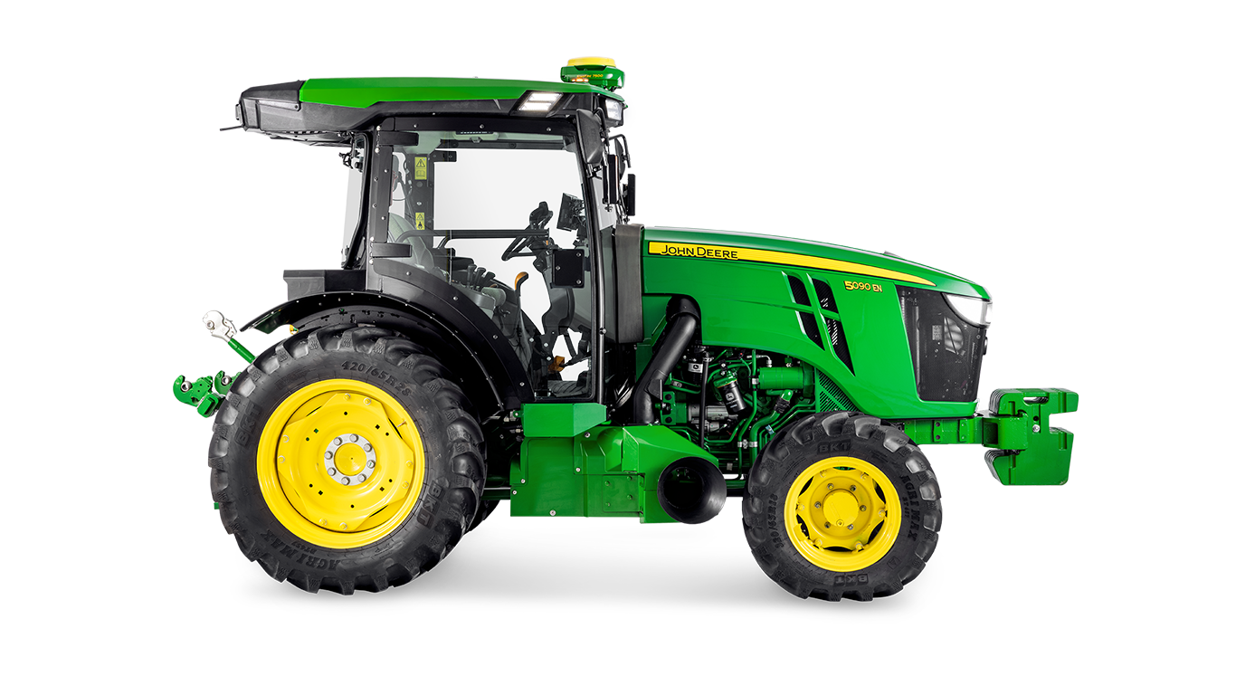 Stranski profil traktorja John Deere 5090EN, ki poudarja zasnovo kabine in velike zadnje pnevmatike.